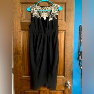 Black with lacy cream detail on the shoulder and back